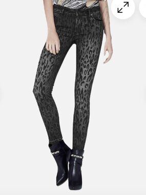 New unworn mid rise leopard print rock skinny jeans